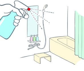 バスタブ、シャワー、ボトル、スツールのあるバスルームで、手でクリーナーをスプレーしているイラスト。.
